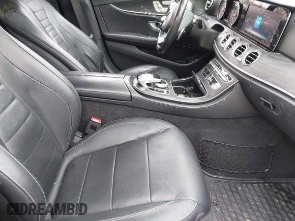 2018 Mercedes-Benz E with VIN WDDZF4KBXJA437064, listed as a IAAI auction lot 41902236 with 47,657 mi miles. Bid and sale history available at carsss.com. Image 5.
