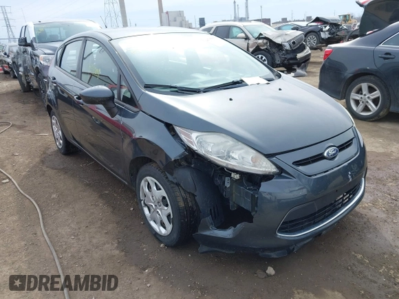 2011 Ford Fiesta SE with VIN 3FADP4EJ6BM137939, listed as a IAAI auction lot 41705008 with 161,166 mi miles. Bid and sale history available at carsss.com. Image 6.