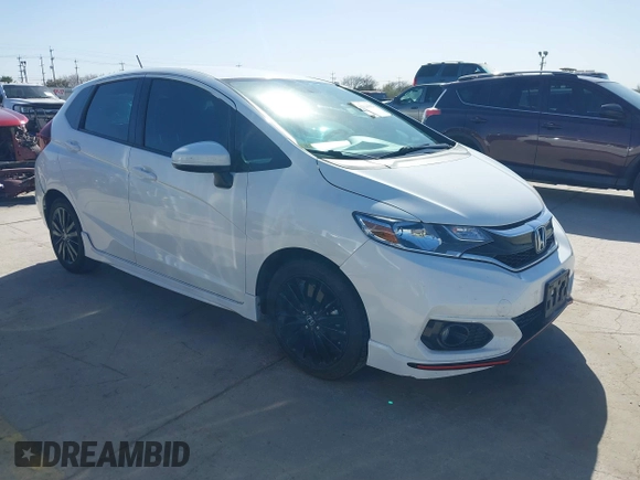 2018 Honda Fit Sport z VIN 3HGGK5H62JM732645, wystawiony jako IAAI lot #41216302 z przebiegiem 107 128 mil mil oraz . Historia ofert i sprzedaży dostępna na DreamBid. Obrazek 1.