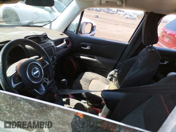2015 Jeep Renegade Trailhawk z VIN ZACCJBCT9FPB21561, wystawiony jako Copart lot #63051673 z przebiegiem Nie podano mil oraz Szkoda całkowita • Salvage title. Historia ofert i sprzedaży dostępna na DreamBid. Obrazek 7.