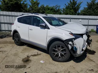 2018 Toyota RAV4 SE with VIN 2T3JFREV9JW801731, listed as a Copart auction lot 55866485 with 64,043 mi miles and Salvage title. Bid and sale history available at DreamBid. Image 4.
