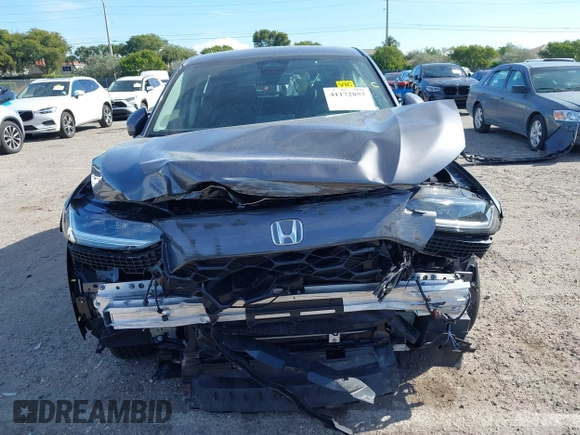 2025 Honda HR-V EX-L z VIN 3CZRZ1H72SM700908, wystawiony jako IAAI lot #41172857 z przebiegiem 6229 mil mil oraz . Historia ofert i sprzedaży dostępna na DreamBid. Obrazek 6.