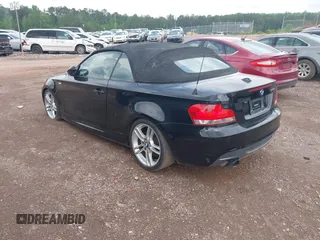 2009 BMW 1 Series 135i with VIN WBAUN93569VK40701, listed as a IAAI auction lot 42099169 with 115,997 mi miles and . Bid and sale history available at DreamBid. Image 3.