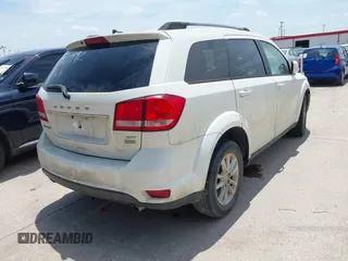 2017 Dodge Journey SXT z VIN 3C4PDCBG4HT590992, wystawiony jako IAAI lot #42378549 z przebiegiem 275 884 mil mil oraz . Historia ofert i sprzedaży dostępna na DreamBid. Obrazek 4.