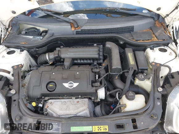 2007 MINI Hardtop with VIN WMWMF33557TL67653, listed as a IAAI auction lot 42581219 with 147,115 mi miles and . Bid and sale history available at DreamBid. Image 10.