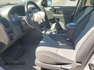 2005 Ford Escape XLS Value with VIN 1FMYU92Z55KC93604, listed as a Copart auction lot 60104145 with 86,788 mi miles and Salvage title. Bid and sale history available at DreamBid. Image 7.