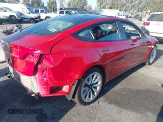 2023 Tesla Model 3 with VIN 5YJ3E1EA9PF695547, listed as a IAAI auction lot 40100334 with Not Provided miles and . Bid and sale history available at DreamBid. Image 4.