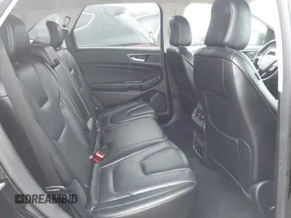 2021 Ford Edge Titanium z VIN 2FMPK3K99MBA16882, wystawiony jako IAAI lot #42214606 z przebiegiem 140 031 mil mil oraz . Historia ofert i sprzedaży dostępna na DreamBid. Obrazek 8.