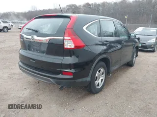2015 Honda CR-V LX with VIN 2HKRM3H35FH501019, listed as a IAAI auction lot 41014683 with 111,168 mi miles and . Bid and sale history available at carsss.com. Image 4.