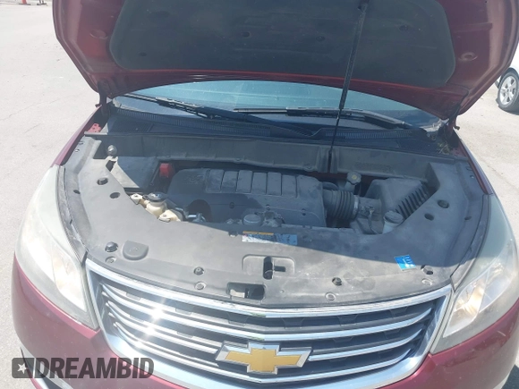 2015 Chevrolet Traverse LT z VIN 1GNKVHKD2FJ241884, wystawiony jako IAAI lot #42452598 z przebiegiem 194 214 mil mil oraz . Historia ofert i sprzedaży dostępna na DreamBid. Obrazek 10.