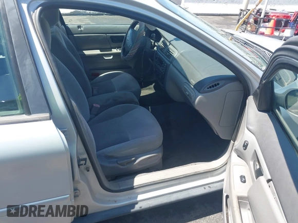 2003 Ford Taurus SE Standard with VIN 1FAFP53UX3G268265, listed as a IAAI auction lot 42090151 with 139,734 mi miles. Bid and sale history available at carsss.com. Image 5.