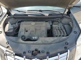 2013 Cadillac SRX Premium Collection с VIN 3GYFNJE33DS569034, выставлен на аукционе Copart как лот 60016355 с пробегом 117 595 миль миль и Чистый • Clean title. История ставок и продаж доступна на DreamBid. Изображение 12.