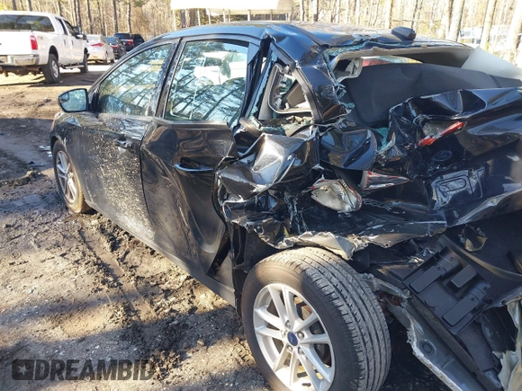 2018 Ford Focus SE with VIN 1FADP3F20JL218002, listed as a IAAI auction lot 41636952 with 90,059 mi miles and . Bid and sale history available at carsss.com. Image 3.