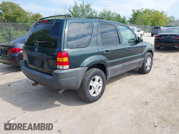 2004 Ford Escape XLT with VIN 1FMYU93124DA08711, listed as a IAAI auction lot 42798957 with 231,771 mi miles and . Bid and sale history available at DreamBid. Image 4.