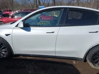 2024 Tesla Model Y Performance with VIN 7SAYGDEF3RA281969, listed as a IAAI auction lot 41680674 with 22,615 mi miles and . Bid and sale history available at DreamBid. Image 14.