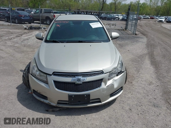 2014 Chevrolet Cruze 1LT z VIN 1G1PC5SB7E7419746, wystawiony jako IAAI lot #42135102 z przebiegiem 134 816 mil mil oraz . Historia ofert i sprzedaży dostępna na DreamBid. Obrazek 12.
