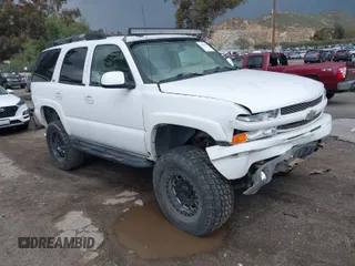 2004 Chevrolet Tahoe Z71 z VIN 1GNEK13T24R321042, wystawiony jako IAAI lot #41798224 z przebiegiem 219 735 mil mil oraz . Historia ofert i sprzedaży dostępna na DreamBid. Obrazek 1.