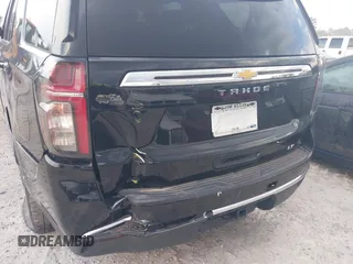 2021 Chevrolet Tahoe LT z VIN 1GNSCNKD8MR248213, wystawiony jako IAAI lot #41173322 z przebiegiem 121 393 mil mil oraz . Historia ofert i sprzedaży dostępna na DreamBid. Obrazek 19.