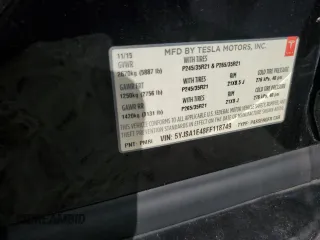 2015 Tesla Model S 85D with VIN 5YJSA1E48FF118749, listed as a Copart auction lot 54516035 with 115,380 mi miles and Salvage Title. Bid and sale history available at carsss.com. Image 12.