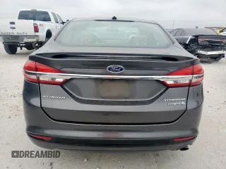 2017 Ford Fusion Hybrid Titanium with VIN 3FA6P0RU7HR388521, listed as a Copart auction lot 57318895 with 117,720 mi miles and Salvage title. Bid and sale history available at DreamBid. Image 6.
