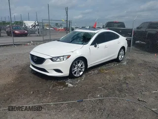 2016 Mazda 6 i Touring with VIN JM1GJ1V56G1448334, listed as a IAAI auction lot 42075222 with 52,883 mi miles. Bid and sale history available at carsss.com. Image 2.