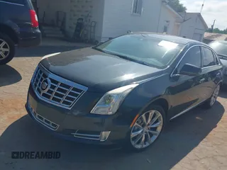 2013 Cadillac XTS Luxury z VIN 2G61P5S37D9110658, wystawiony jako IAAI lot #42196442 z przebiegiem 182 228 mil mil oraz . Historia ofert i sprzedaży dostępna na DreamBid. Obrazek 18.