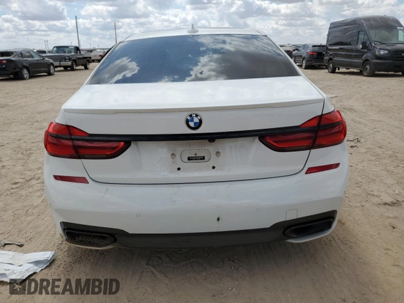 2018 BMW 7 Series 740i with VIN WBA7E2C51JG742075, listed as a Copart auction lot 65057923 with 0 mi miles. Bid and sale history available at carsss.com. Image 6.