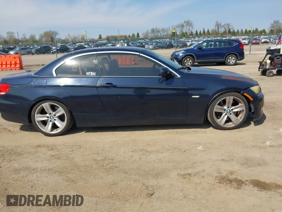 2010 BMW 3 Series 335i with VIN WBAWL7C59AP475993, listed as a IAAI auction lot 42112968 with 101,373 mi miles. Bid and sale history available at carsss.com. Image 13.