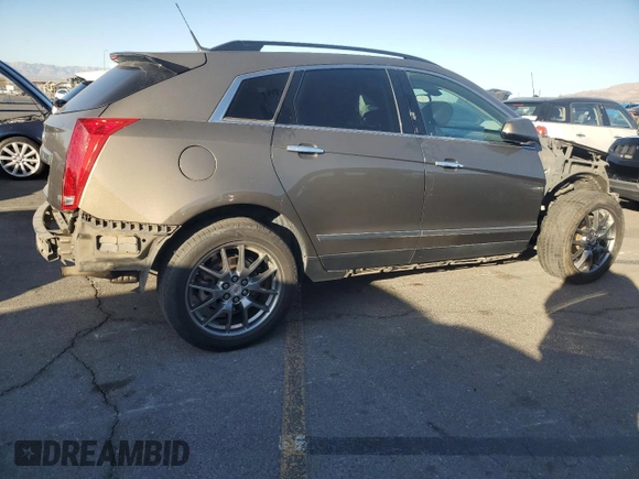 2014 Cadillac SRX z VIN 3GYFNAE34ES561414, wystawiony jako Copart lot #44760395 z przebiegiem 131 723 mil mil oraz Szkoda całkowita • Salvage title. Historia ofert i sprzedaży dostępna na DreamBid. Obrazek 3.