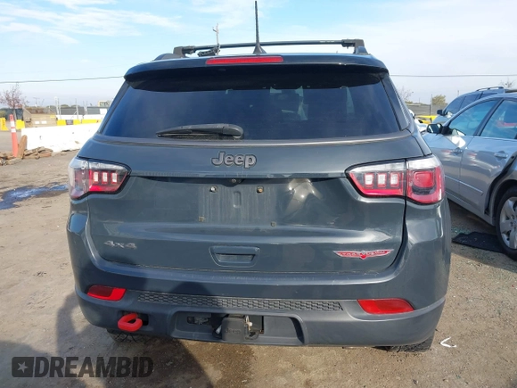 2017 Jeep Compass Trailhawk with VIN 3C4NJDDBXHT657425, listed as a IAAI auction lot 41022289 with 83,003 mi miles and . Bid and sale history available at DreamBid. Image 16.