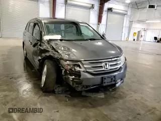 2012 Honda Odyssey Touring with VIN 5FNRL5H98CB028309, listed as a Copart auction lot 57663485 with 233,921 mi miles and Salvage title. Bid and sale history available at DreamBid. Image 14.