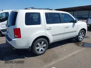 2013 Honda Pilot Touring with VIN 5FNYF4H92DB031589, listed as a IAAI auction lot 42159313 with 192,604 mi miles and . Bid and sale history available at carsss.com. Image 4.