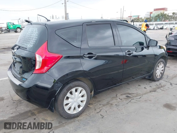 2015 Nissan Note SV with VIN 3N1CE2CP8FL363857, listed as a IAAI auction lot 42087997 with 140,496 mi miles and . Bid and sale history available at DreamBid. Image 4.