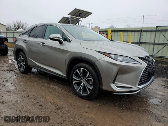 2022 Lexus RX with VIN 2T2HZMDA4NC321485, listed as a Copart auction lot 70409922 with 8,963 mi miles. Bid and sale history available at carsss.com. Image 4.