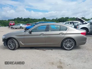 2018 BMW 5 Series 530i xDrive with VIN WBAJA7C55JG909519, listed as a IAAI auction lot 42650263 with 57,077 mi miles and . Bid and sale history available at DreamBid. Image 14.
