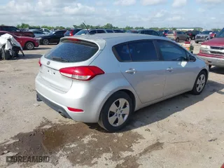 2016 Kia Forte 5-Door LX with VIN KNAFK5A8XG5629507, listed as a IAAI auction lot 42098605 with 140,627 mi miles. Bid and sale history available at carsss.com. Image 4.