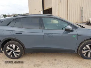 2023 Volkswagen ID.4 Pro z VIN 1V2DNPE85PC048594, wystawiony jako IAAI lot #41760977 z przebiegiem 623 mil mil oraz . Historia ofert i sprzedaży dostępna na DreamBid. Obrazek 13.