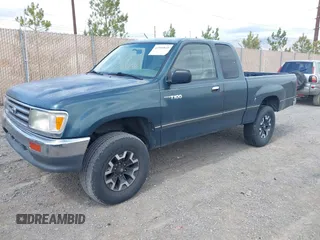 1996 Toyota T100 DX with VIN JT4UN22D9T0034196, listed as a IAAI auction lot 41969849 with 211,309 mi miles and . Bid and sale history available at carsss.com. Image 2.