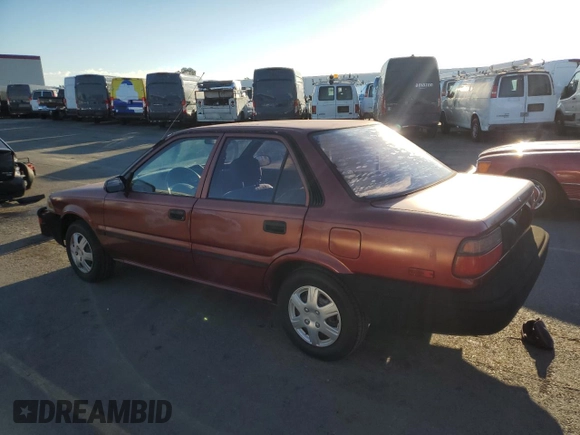 1989 Toyota Corolla with VIN JT2AE92E4K0112945, listed as a Copart auction lot 83382604 with 209,462 mi miles and Salvage title. Bid and sale history available at DreamBid. Image 2.