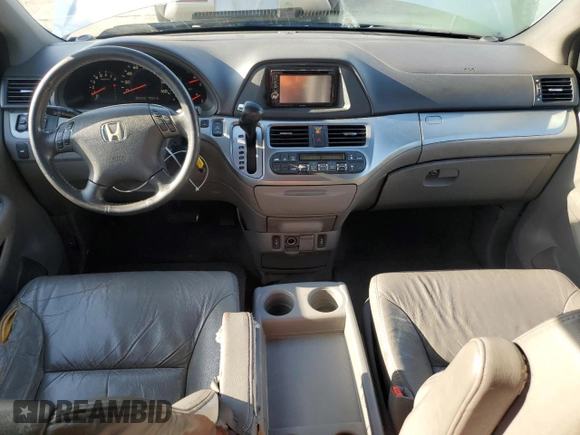 2009 Honda Odyssey EX-L with VIN 5FNRL38619B044063, listed as a Copart auction lot 52372505 with 204,658 mi miles and Salvage Title. Bid and sale history available at DreamBid. Image 8.