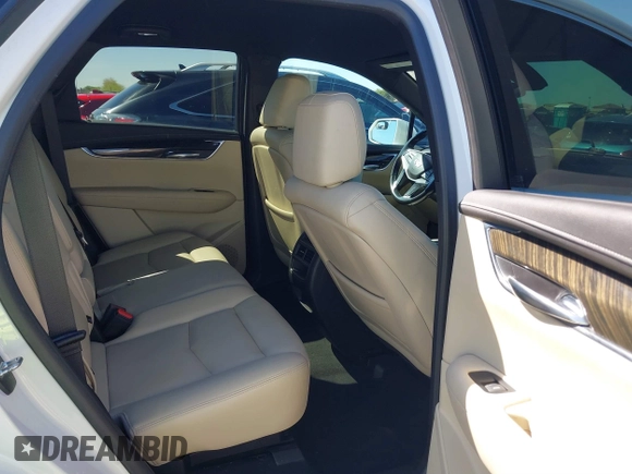 2019 Cadillac XT5 FWD with VIN 1GYKNARS1KZ135419, listed as a IAAI auction lot 41860022 with 63,395 mi miles and . Bid and sale history available at DreamBid. Image 8.