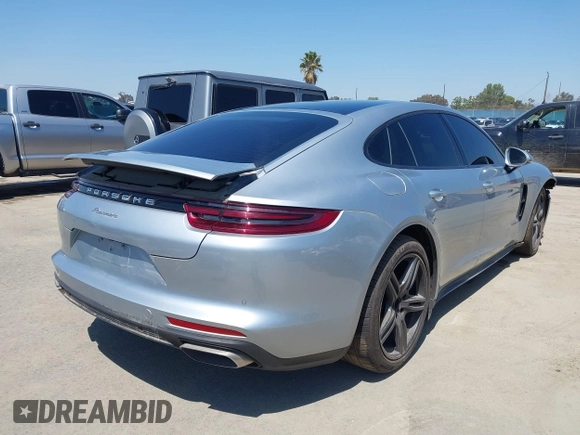 2020 Porsche Panamera z VIN WP0AA2A75LL101708, wystawiony jako IAAI lot #39900713 z przebiegiem 13 098 mil mil oraz . Historia ofert i sprzedaży dostępna na DreamBid. Obrazek 4.