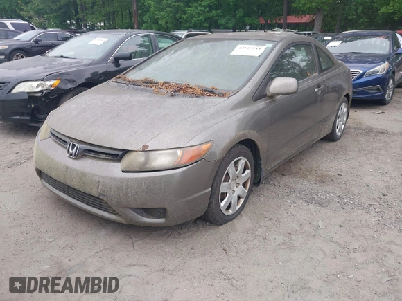 2008 Honda Civic Cpe LX with VIN 2HGFG11638H524802, listed as a IAAI auction lot 42117211 with 145,778 mi miles. Bid and sale history available at carsss.com. Image 2.