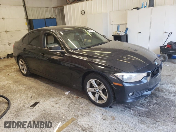 2014 BMW 3 Series 320i xDrive with VIN WBA3C3C53EP661742, listed as a Copart auction lot 62230775 with Not provided miles and Clean title. Bid and sale history available at DreamBid. Image 4.