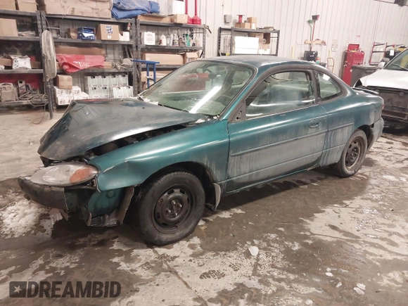 1998 Ford Escort z VIN 3FALP1133WR140551, wystawiony jako IAAI lot #41649509 z przebiegiem 123 861 mil mil oraz . Historia ofert i sprzedaży dostępna na DreamBid. Obrazek 2.