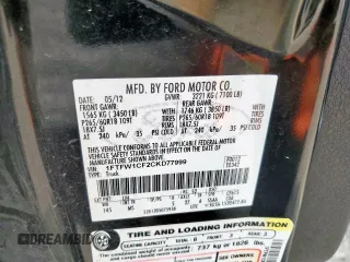 2012 Ford F-150 XL z VIN 1FTFW1CF2CKD77999, wystawiony jako Copart lot #57271655 z przebiegiem 168 577 mil mil oraz Szkody całkowita. Historia ofert i sprzedaży dostępna na DreamBid. Obrazek 13.