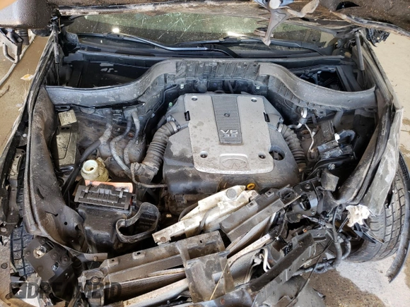 2010 Infiniti FX35 with VIN JN8AS1MWXAM854771, listed as a Copart auction lot 70682914 with 163,118 mi miles and Salvage Title. Bid and sale history available at carsss.com. Image 12.