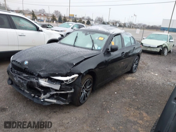 2020 BMW 3 Series 330i xDrive with VIN WBA5R7C08LFH44012, listed as a IAAI auction lot 41252675 with 57,486 mi miles. Bid and sale history available at carsss.com. Image 2.