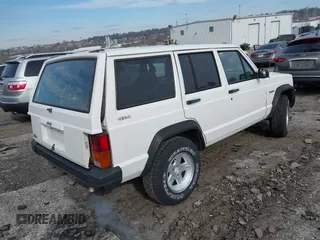 1996 Jeep Cherokee Sport with VIN 1J4FJ68S6TL234012, listed as a IAAI auction lot 41571658 with 255,817 mi miles. Bid and sale history available at carsss.com. Image 4.