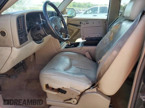 2005 GMC Yukon SLT z VIN 1GKEC13TX5R106956, wystawiony jako Copart lot #52486205 z przebiegiem 317 375 mil mil oraz Szkoda całkowita • Salvage title. Historia ofert i sprzedaży dostępna na DreamBid. Obrazek 7.